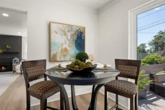 Dining area off the kitchen with brand new slider doors that open onto the new deck.
