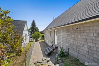 Another view of the full-fenced area. The flat upper area is also perfectly positioned for a future shed or garden space.