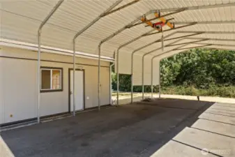 Large Carport with 30 amp service. Sellers had 2 RVs parked here!