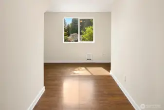 Den includes large closet area under stairs