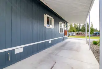 Enlongated Carport with a Charging Station