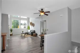 Enter onto the LVP flooring and fresh interior paint