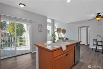 Kitchen looks out over the covered patio