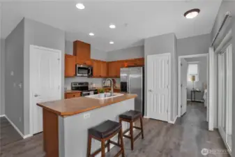 Kitchen offers a pantry and storage closet