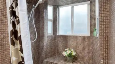 Beautiful Tile encased spa inspired shower and tub!