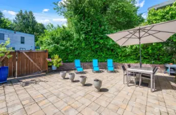 Fenced and very private, the expansive patio is ideal for entertaining.