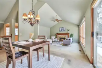 Formal dining area with slider to back deck