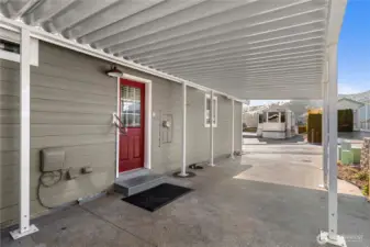 This carport fits 2 cars parked tandem