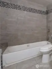 Main Floor Tile Shower Surround & Seat