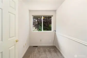 The flex space behind the kitchen could be a half bath or laundry. The washer, dryer and utility sink are behind the wall on the right.