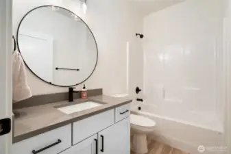 Guest Bathroom -Pics are of a different 2014 plan. Features and colors may differ.