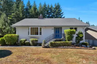 Incredibly well maintained and charming 1940's home tucked down nice suburban neighborhood  ... (photo'd prior to grass greening up and being serviced again). Roof recently serviced and inspected.