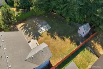 Overview of backyard prior to being serviced and green again... Roof recently serviced and inspected...