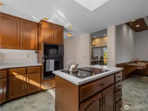 Youll find all the modern amenities you could hope for in this kitchen, along with a wall oven and large wall microwave oven.