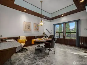 There is also a built in desk in the casual dining room and large windows looking onto the side yard.