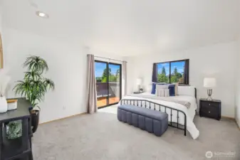 Primary bedroom with patio.