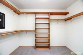 Primary bedroom walk in closet.
