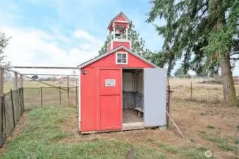 The red chcken coop. What is a little farm without a chicken coop?