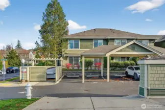 Back of unit with carport area