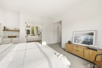 Main-floor guest suite that lives like a second primary—double vanity, oversized shower, and a generous closet which is ideal for guests or multigenerational living.