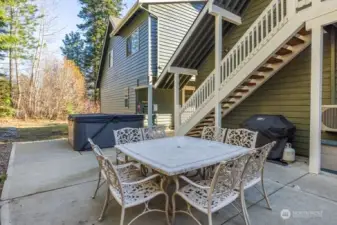 1 of 2 large outdoor table included. weber gas grill included too