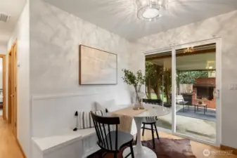 Dining with built in dining bench with direct access to the covered patio.