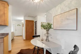 Dining area looking at very large walk in closet.