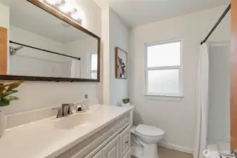 Large bathroom vanity with storage.