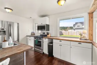 Large window and skylight letting in lots of natural light
