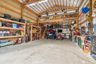 Detached garage with wood burning stove & large loft space