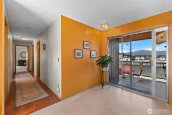 Entry leads to bedroom wing and sliders to patio