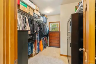 Large walk-in closet. Flooring under safe was built to support safe weight.