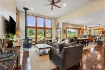 Open concept living room with picture windows