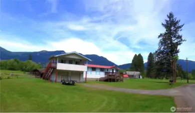 featuring 3 beds +bonus room!  2.31 Acres, spectacular panoramic Views, Large garden, fruit trees, well, septic & much more!!