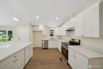 NEW, NEW, NEW- be the first to cook in this kitchen- white shaker cabinets, LOTS of countertop space, stainless steel appliances & LVP flooring!
