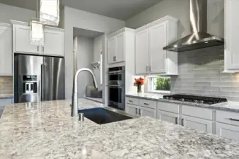 Premium KitchenAid appliances and apron sink