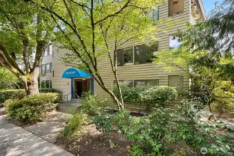 Nestled across from Ravenna Park, this serene one-bedroom condo w/den at The Ravenna House offers peaceful living in a coveted location.