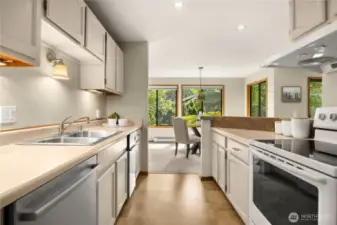 Kitchen has been freshly painted and offers plenty of storage and counter space.