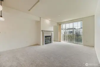 Open layout makes the living room feel spacious & inviting.