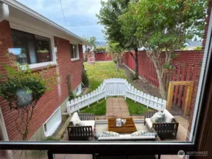 View from your living room of the lovely backyard and mountains (not pictured since it was a cloudy day)
