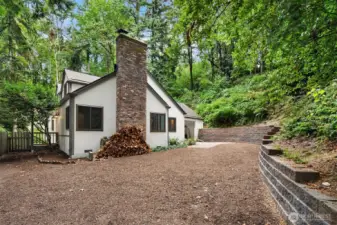 Back of the house. The retaining wall is new.