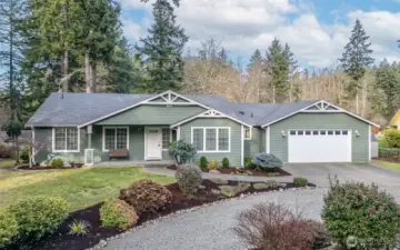 Charming single-level home settled near the Purdy Bridge in Wauna.