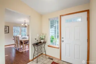Glowing entry way, leading to an easy transition from entry to kitchen and dining.