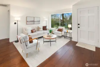 This West facing-renovated 1940's Ravenna bungalow, cherishes wide plank hard wood flooring throughout main floor-from a World War II Armory proving warmth & history, picturesque living room window and new-fresh interior paint.