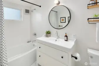 Updated primary bathroom en-suite, with heated floors.