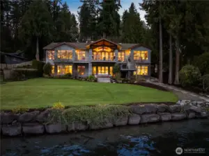 Set along one of Mercer Island’s most treasured stretches of East Mercer Way, this remarkable waterfront estate captures the essence of Pacific Northwest lakefront living.