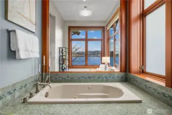 Framed by water and sky, this soaking tub invites you to linger just a little longer.