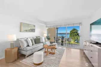 This light-filled penthouse features an updated kitchen and bath, new flooring, and the convenience of an in-unit washer and dryer.