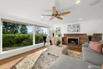 Main living area with natural light and water views
