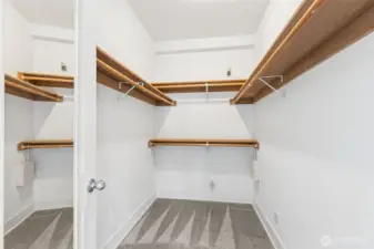 Walk-in closet in the second bedroom suite—both bedrooms feature their own walk-in closets.